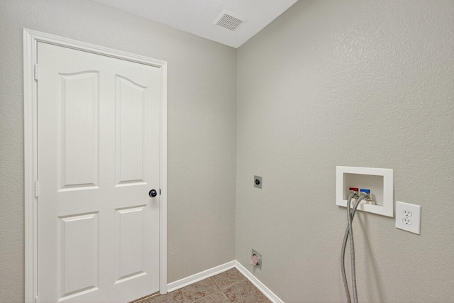 5537 Seabury Dr, Fort Worth, TX 76137 - laundry area featuring electric dryer hookup, washer hookup, and light tile patterned flooring