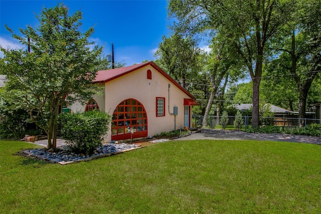 6812 Clayton Ave, Dallas, TX 75214 - rear view of property with stucco siding