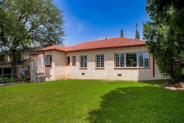 6812 Clayton Ave, Dallas, TX 75214 - back of property featuring a tile roof, stucco siding, and a chimney