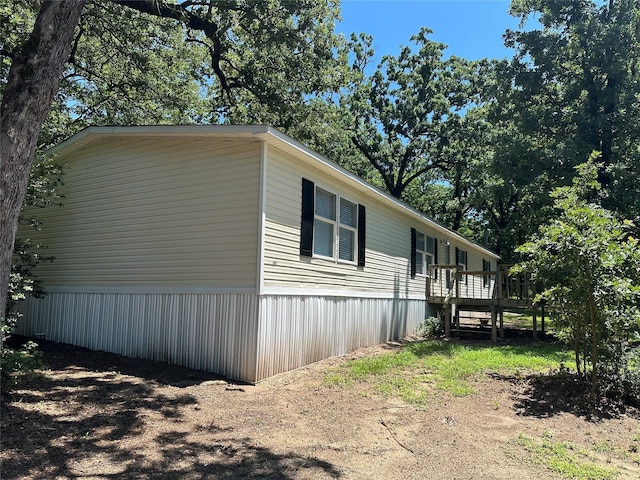 437 Maple Dr, Murchison, TX 75778 - view of property exterior featuring a wooden deck