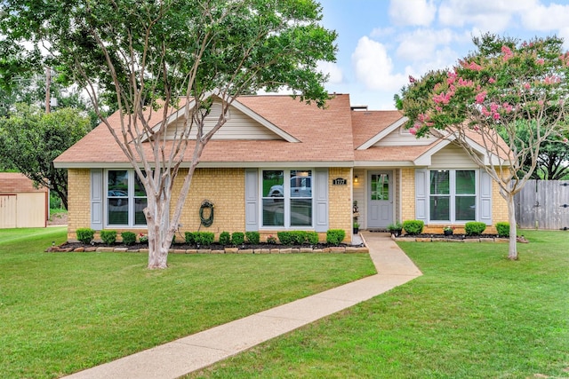 1737 Live Oak Ct, Lewisville, TX 75067 - view of front of home featuring brick siding and roof with shingles