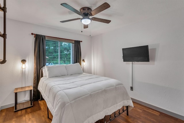 1737 Live Oak Ct, Lewisville, TX 75067 - bedroom featuring wood finished floors and a ceiling fan