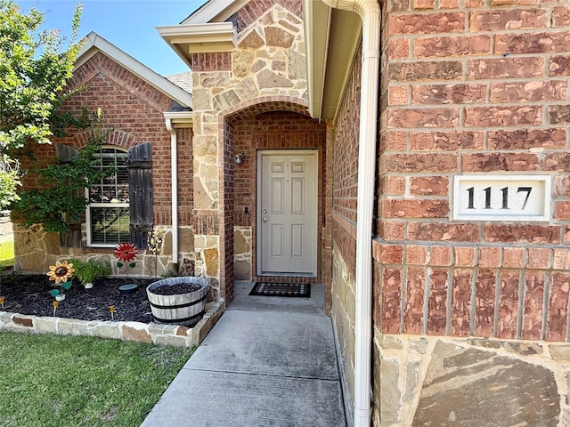 1117 Prairie Heights Dr, Fort Worth, TX 76108 - view of exterior entry featuring brick siding