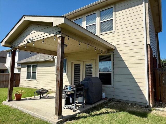 1117 Prairie Heights Dr, Fort Worth, TX 76108 - back of property with a patio and a fire pit