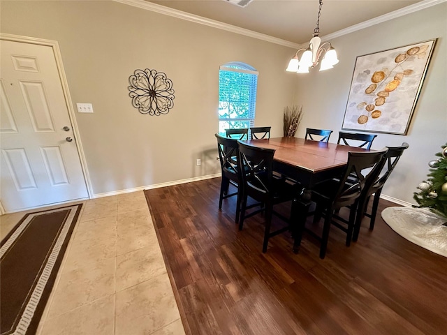 1117 Prairie Heights Dr, Fort Worth, TX 76108 - dining room featuring a chandelier, ornamental molding, and dark tile patterned flooring