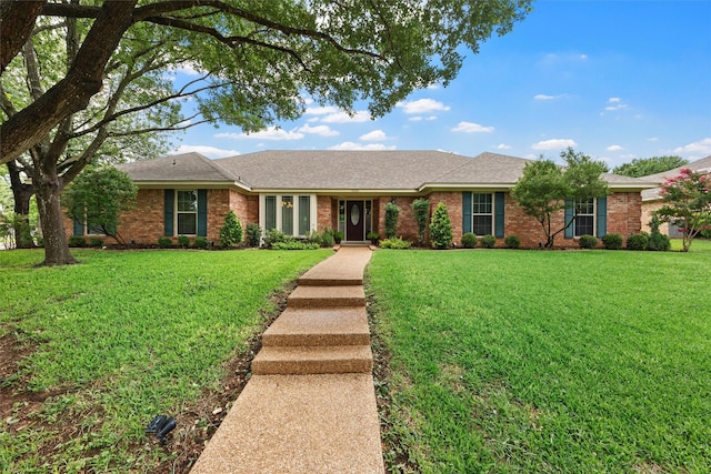 9600 Old Farm Rd, Woodway, TX 76712 - single story home featuring a shingled roof, a front yard, and brick siding