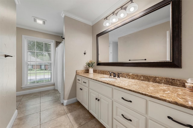 9600 Old Farm Rd, Woodway, TX 76712 - bathroom featuring vanity, ornamental molding, and tile patterned floors