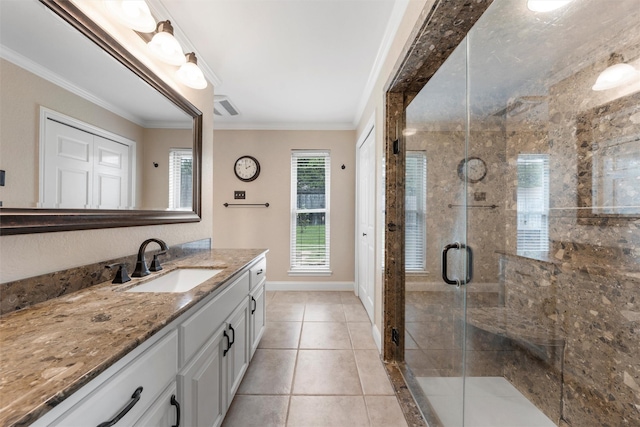 9600 Old Farm Rd, Woodway, TX 76712 - bathroom featuring vanity, ornamental molding, a shower stall, and tile patterned floors