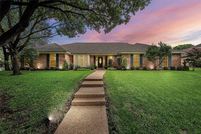 9600 Old Farm Rd, Woodway, TX 76712 - single story home featuring a lawn, brick siding, and roof with shingles