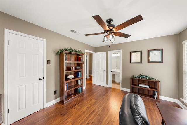 9600 Old Farm Rd, Woodway, TX 76712 - sitting room featuring a ceiling fan and wood finished floors