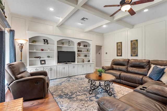 9600 Old Farm Rd, Woodway, TX 76712 - living room with a decorative wall, light wood finished floors, a ceiling fan, beam ceiling, and recessed lighting