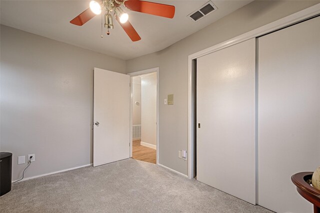 531 Himes Dr, Euless, TX 76039 - unfurnished bedroom featuring carpet floors, a closet, and ceiling fan
