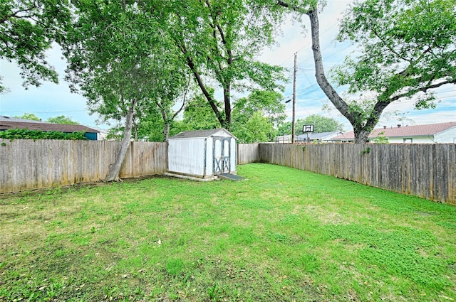 531 Himes Dr, Euless, TX 76039 - fenced backyard with a storage unit