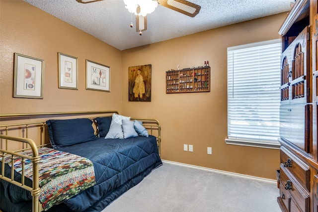 1405 Mapleton Ct, Arlington, TX 76018 - bedroom with carpet flooring, a textured ceiling, and a ceiling fan