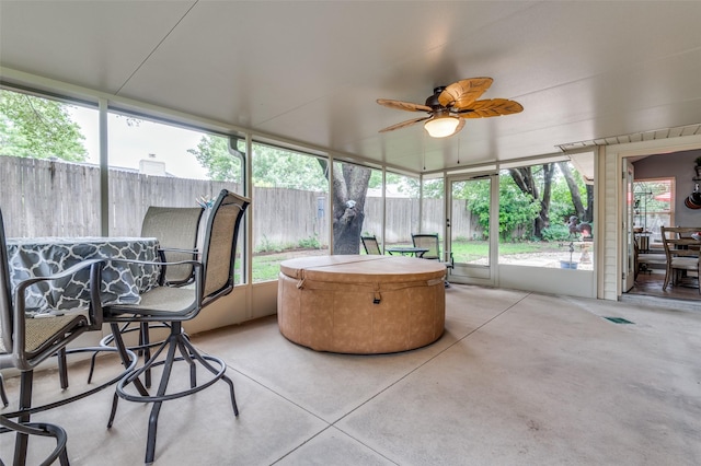 1405 Mapleton Ct, Arlington, TX 76018 - sunroom featuring ceiling fan and a hot tub