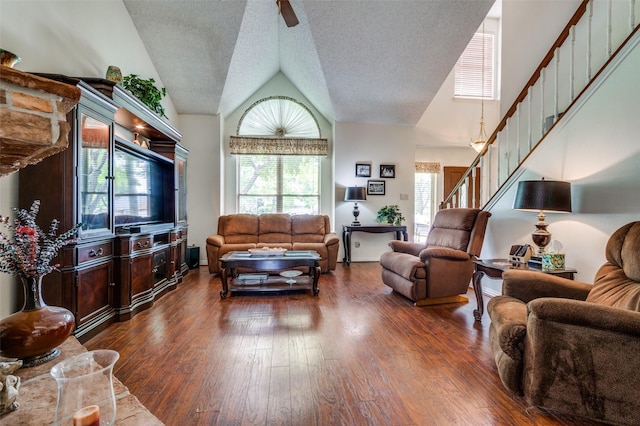 1405 Mapleton Ct, Arlington, TX 76018 - living area with lofted ceiling, stairway, dark wood-style floors, and a textured ceiling
