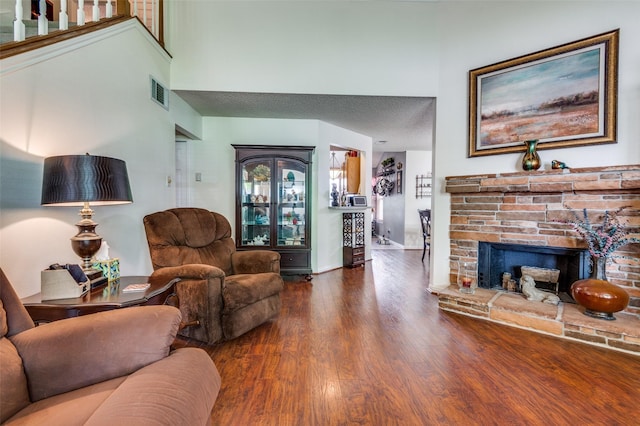 1405 Mapleton Ct, Arlington, TX 76018 - living area with wood finished floors and a fireplace