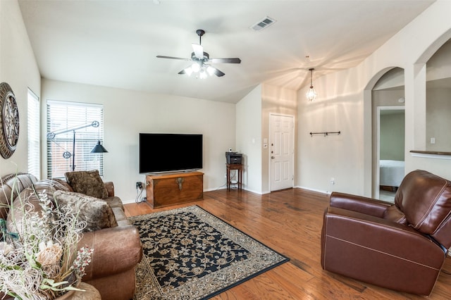 1138 Sophia St, Allen, TX 75013 - living area with wood finished floors, ceiling fan, and arched walkways