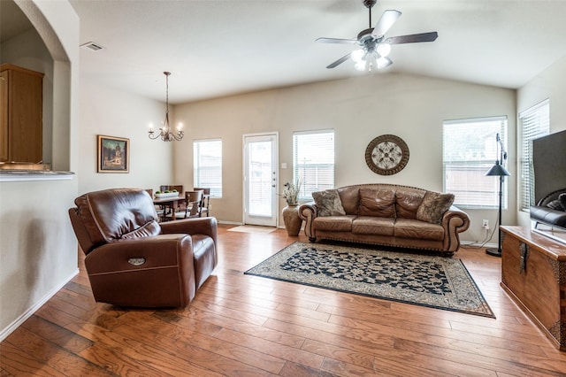 1138 Sophia St, Allen, TX 75013 - living room with a chandelier, ceiling fan, healthy amount of natural light, hardwood / wood-style floors, and vaulted ceiling