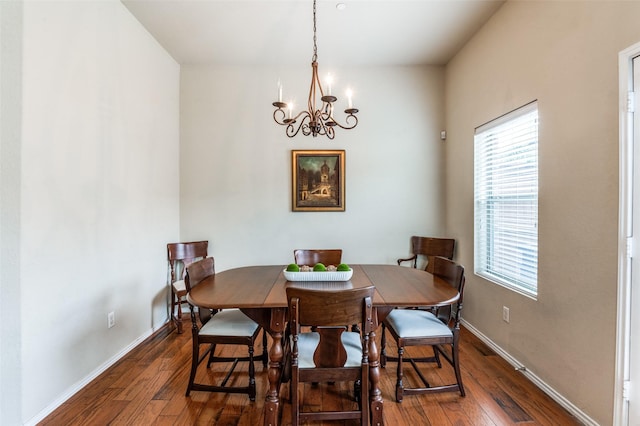 1138 Sophia St, Allen, TX 75013 - dining room with a chandelier, dark wood-type flooring, and healthy amount of natural light
