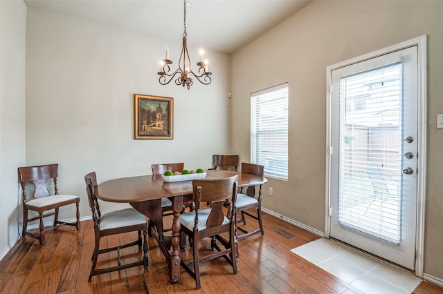 1138 Sophia St, Allen, TX 75013 - dining area with hardwood / wood-style flooring and a chandelier