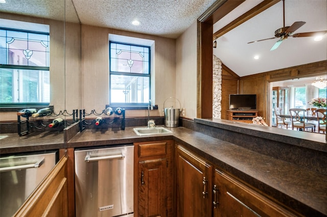 8220 Coolgreene Dr, Dallas, TX 75228 - kitchen featuring dark countertops, a ceiling fan, lofted ceiling, a textured ceiling, and recessed lighting