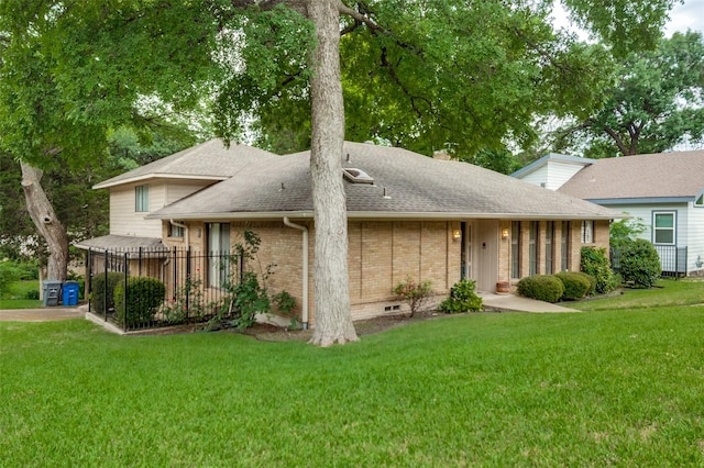 8220 Coolgreene Dr, Dallas, TX 75228 - rear view of property featuring brick siding, a lawn, and roof with shingles