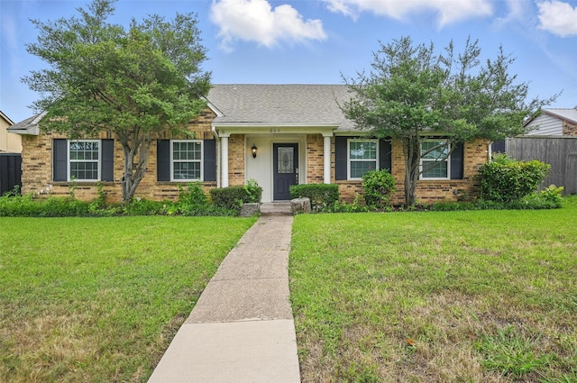 864 Warwick Dr, Plano, TX 75023 - view of front of house featuring brick siding and a shingled roof