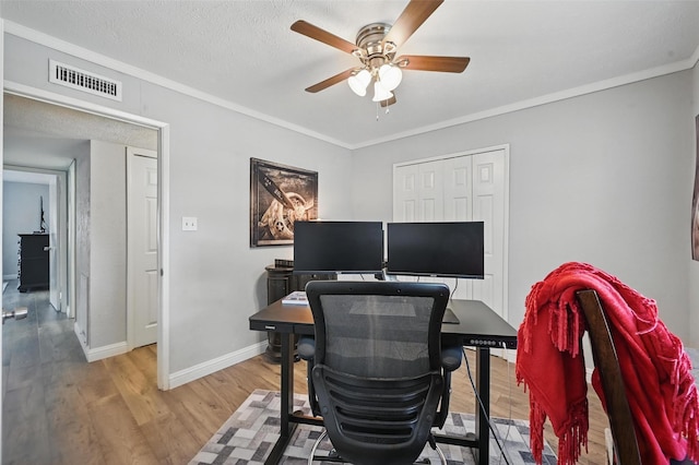 864 Warwick Dr, Plano, TX 75023 - office space featuring a ceiling fan, wood finished floors, and ornamental molding