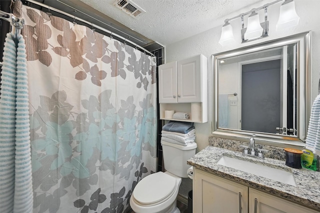 864 Warwick Dr, Plano, TX 75023 - full bath featuring vanity, curtained shower, a textured ceiling, and a textured wall