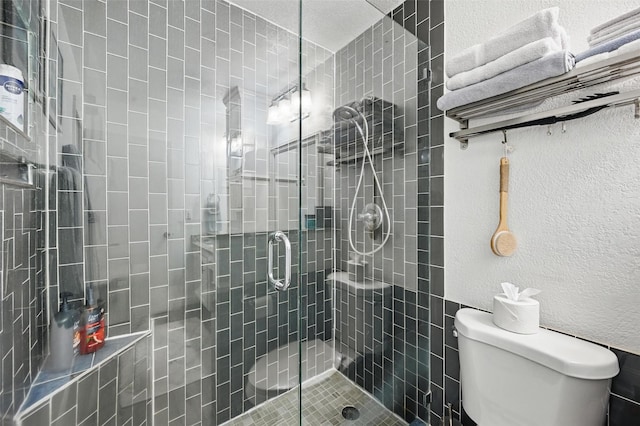 864 Warwick Dr, Plano, TX 75023 - full bathroom with a shower stall and a textured wall