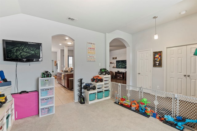6436 Meadowcrest Ln, Sachse, TX 75048 - rec room featuring arched walkways and light colored carpet
