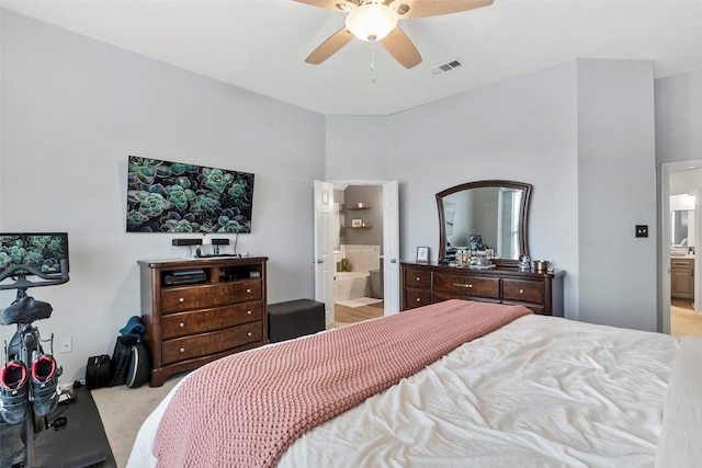6436 Meadowcrest Ln, Sachse, TX 75048 - bedroom with connected bathroom, light carpet, and a ceiling fan