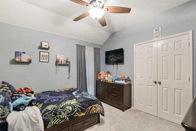 6436 Meadowcrest Ln, Sachse, TX 75048 - bedroom featuring light colored carpet, lofted ceiling, a closet, and a ceiling fan