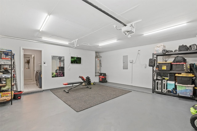 6436 Meadowcrest Ln, Sachse, TX 75048 - garage featuring a garage door opener, gas water heater, electric panel, and washer and dryer