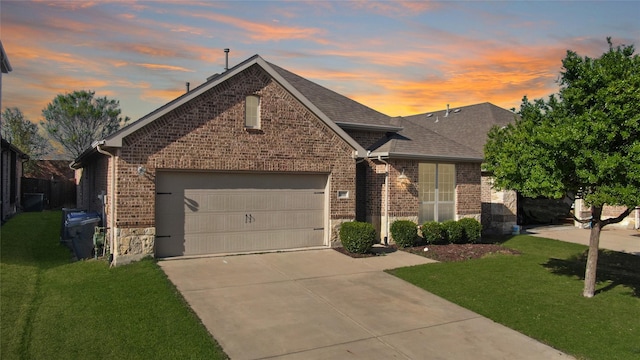 5608 Grove Cove Dr, Mckinney, TX 75071 - view of front of house featuring brick siding, an attached garage, concrete driveway, a lawn, and stone siding