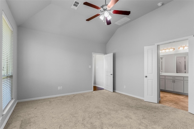 5608 Grove Cove Dr, Mckinney, TX 75071 - unfurnished bedroom featuring light carpet, ensuite bathroom, high vaulted ceiling, and a ceiling fan