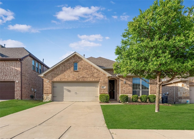 5608 Grove Cove Dr, Mckinney, TX 75071 - view of front of house featuring concrete driveway, brick siding, an attached garage, and a front yard