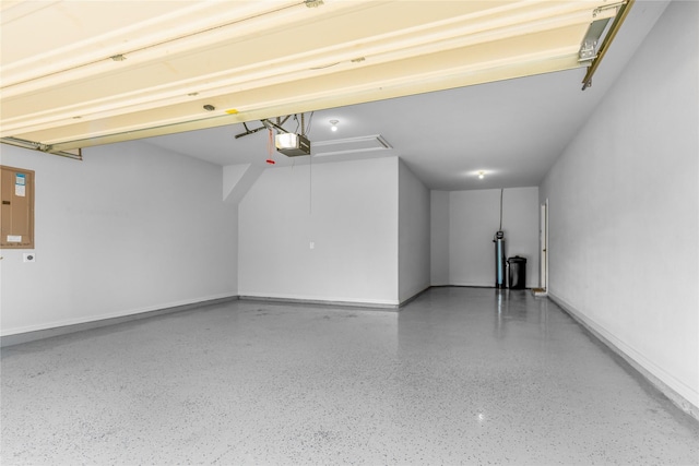 5608 Grove Cove Dr, Mckinney, TX 75071 - garage with a garage door opener and baseboards