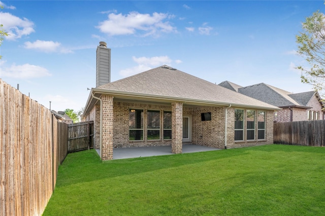 5608 Grove Cove Dr, Mckinney, TX 75071 - rear view of house featuring brick siding, a chimney, a fenced backyard, and a patio area