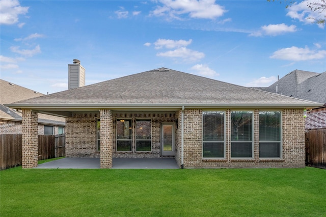 5608 Grove Cove Dr, Mckinney, TX 75071 - rear view of property featuring brick siding, a patio, a chimney, and roof with shingles