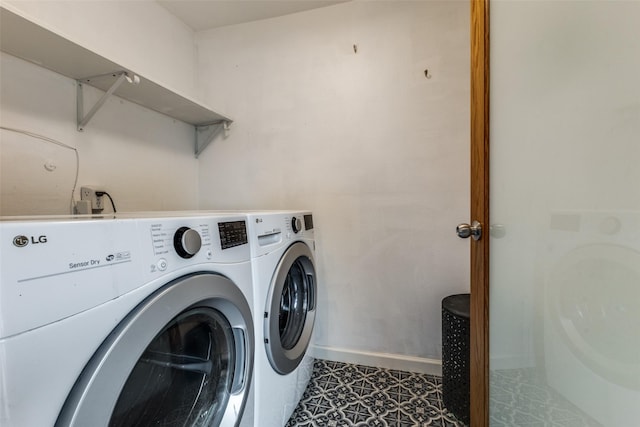 10649 Sylvia Dr, Dallas, TX 75228 - laundry area with separate washer and dryer and tile patterned flooring