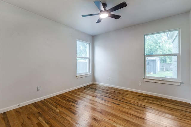 10649 Sylvia Dr, Dallas, TX 75228 - unfurnished room featuring wood finished floors and ceiling fan