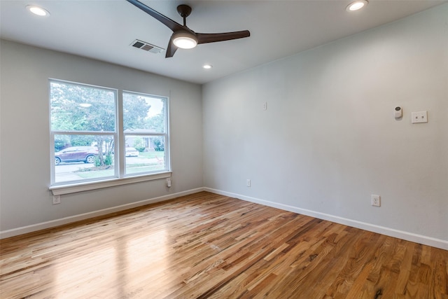 10649 Sylvia Dr, Dallas, TX 75228 - spare room with ceiling fan, wood finished floors, and recessed lighting