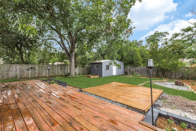 10649 Sylvia Dr, Dallas, TX 75228 - wooden deck featuring a fire pit, a fenced backyard, and a storage unit