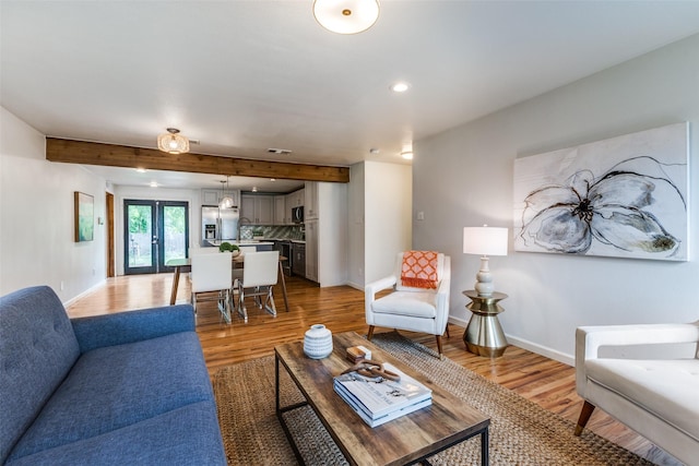 10649 Sylvia Dr, Dallas, TX 75228 - living room with light wood-style floors, recessed lighting, and beamed ceiling