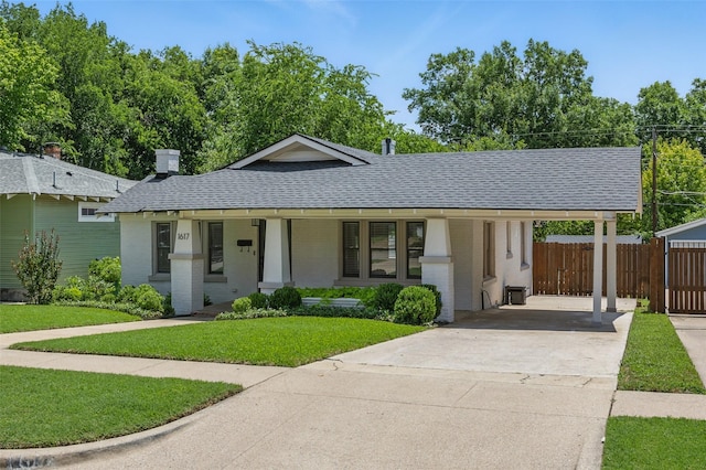 1617 Virginia Pl, Fort Worth, TX 76107 - bungalow featuring concrete driveway, roof with shingles, covered porch, an attached carport, and brick siding