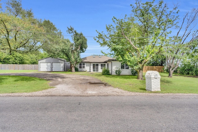 315 Burney Ln, Red Oak, TX 75154 - ranch-style house featuring a garage and an outbuilding