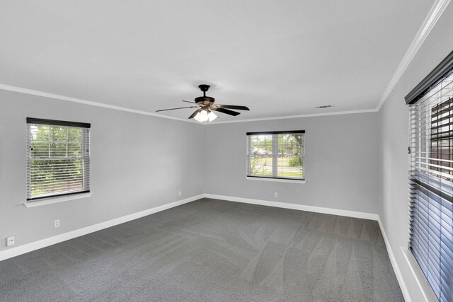 315 Burney Ln, Red Oak, TX 75154 - spare room featuring plenty of natural light, crown molding, a ceiling fan, and dark carpet
