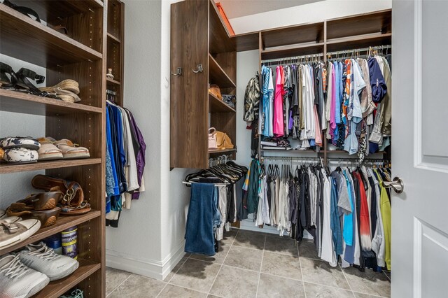 2129 Harbor Pointe Dr, Frisco, TX 75036 - spacious closet with tile patterned flooring